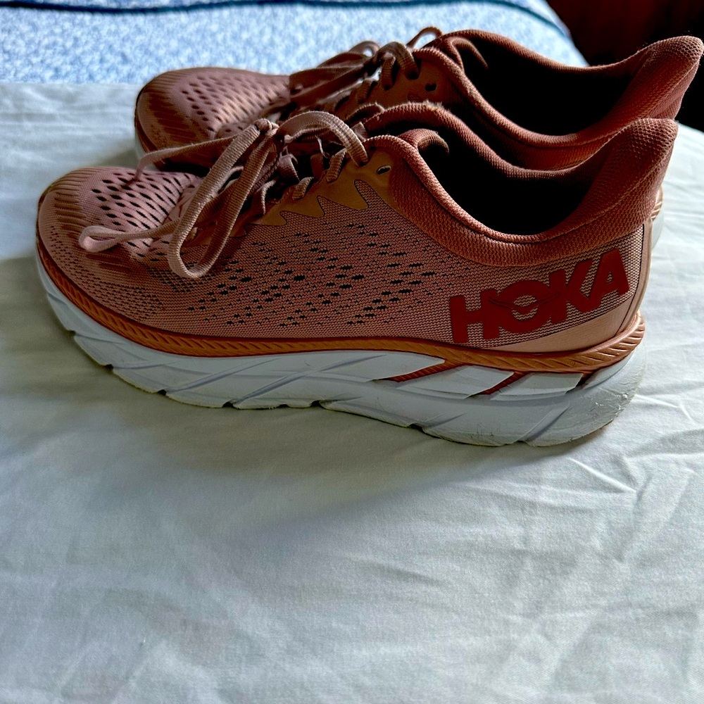 Hoka is used but good condition! Size 7.5 slightly pink.